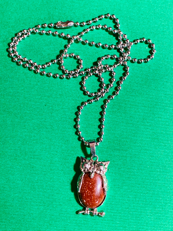 Small Goldstone Owl Pendant on 22